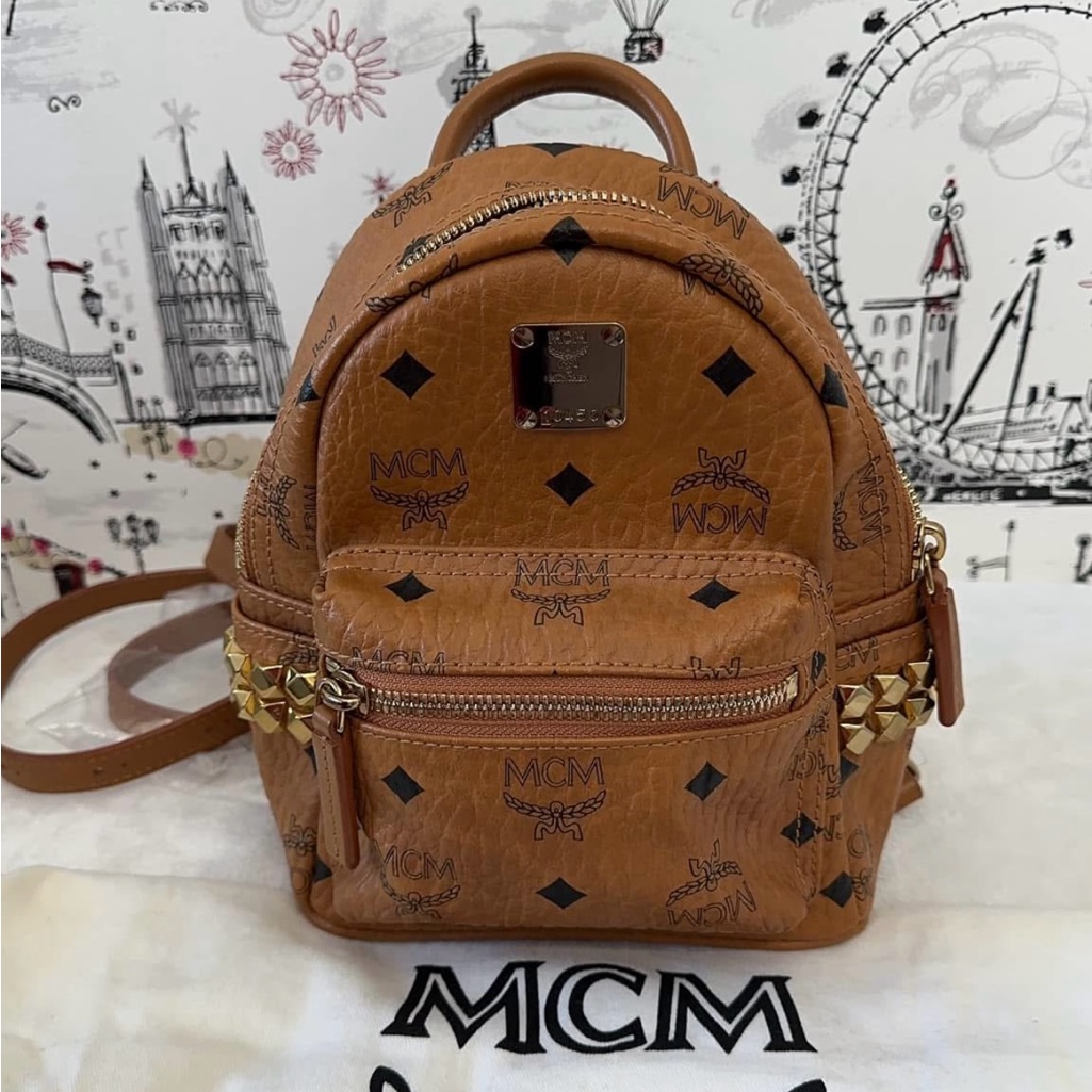 Mcm Small Cognac Backpack With Gold Accents Code: 10450